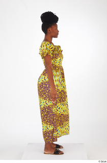 Dina Moses dressed standing whole body yellow long decora apparel…